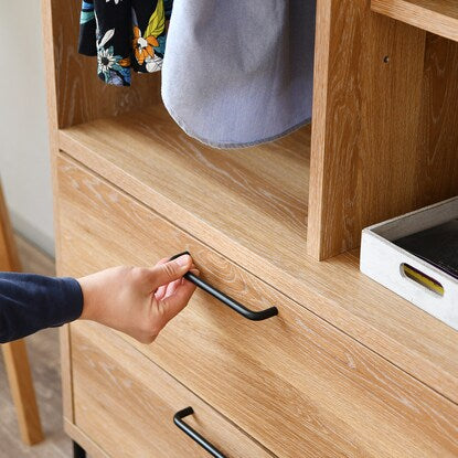 A stylish hanger rack with a wood grain and steel design