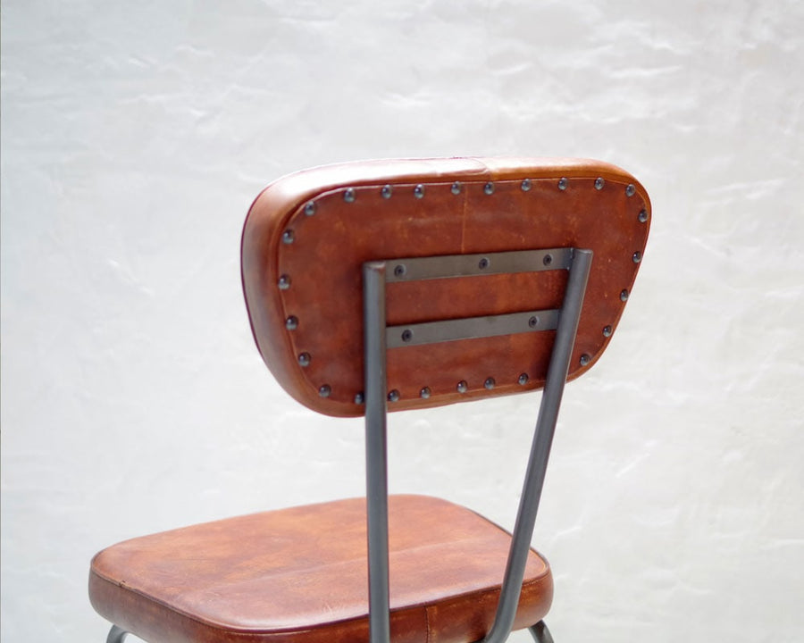 AN LEATHER CHAIR
