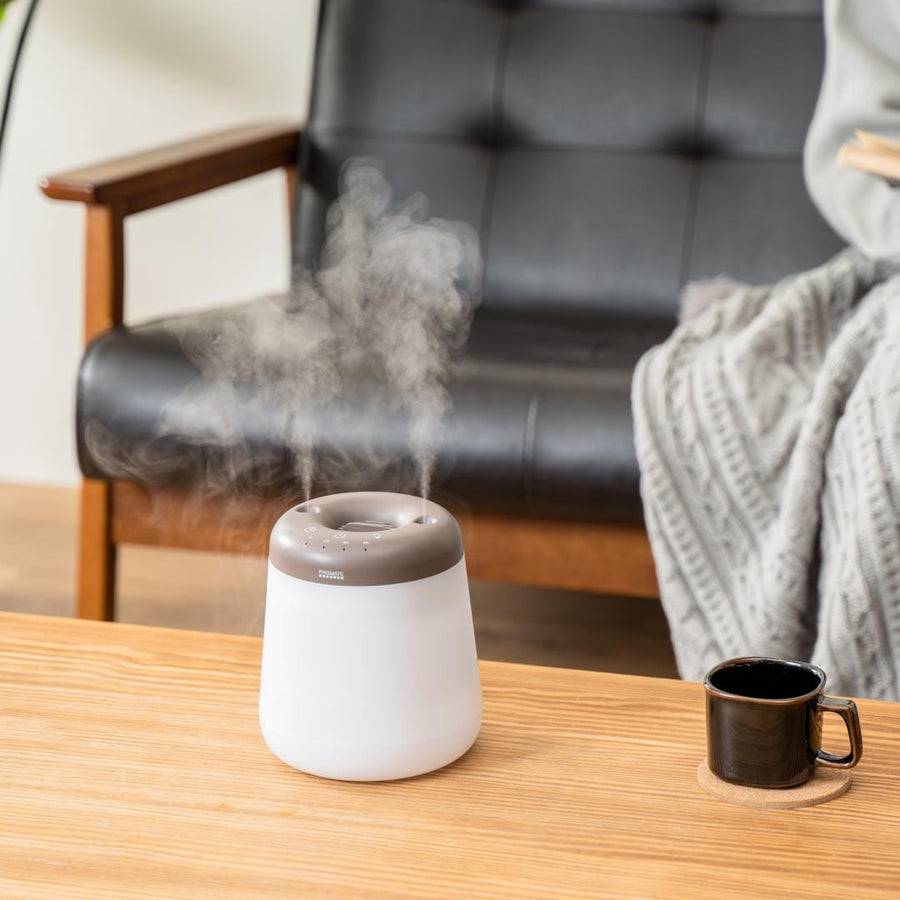 Cordless top-fill humidifier with dual mist function that prevents water spills even if it falls over