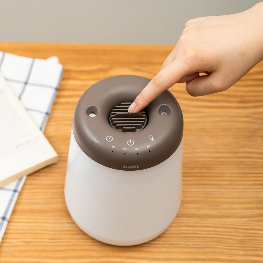 Cordless top-fill humidifier with dual mist function that prevents water from spilling even if it falls over.