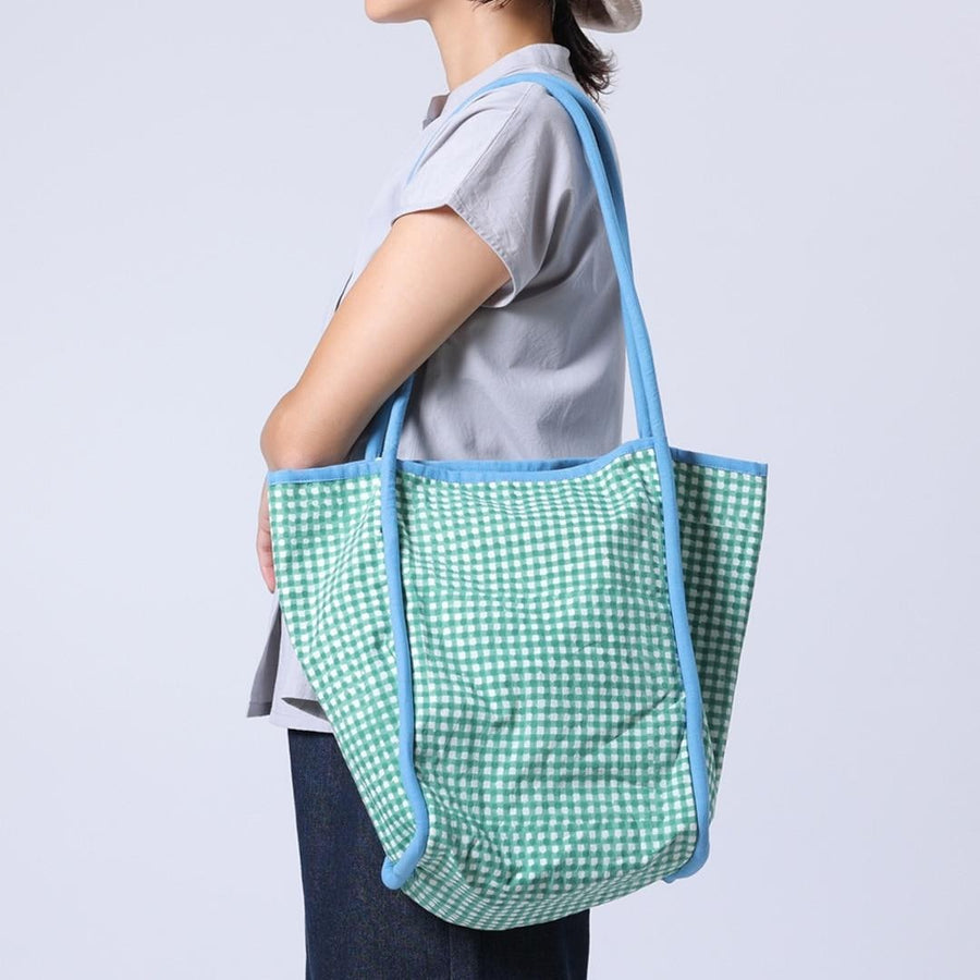 Block-printed gingham check bag with piping accents