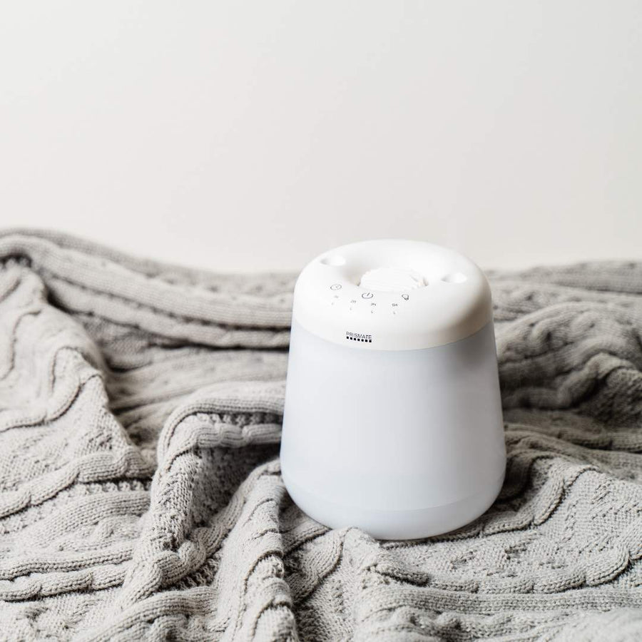Cordless top-fill humidifier with dual mist function that prevents water spills even if it falls over