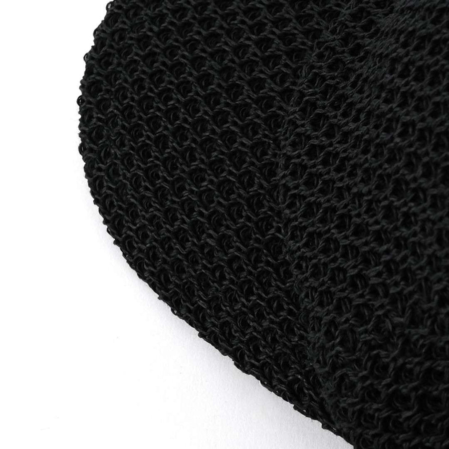 A paper cap that lets air through
