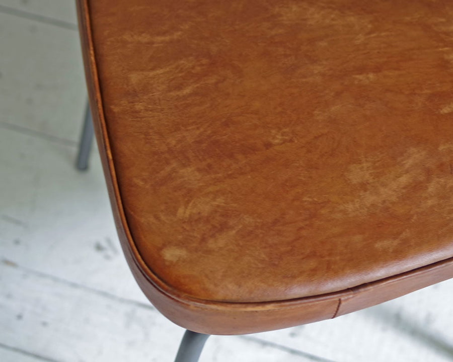 AN LEATHER CHAIR
