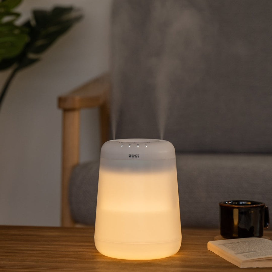 Cordless top-fill humidifier with dual mist function that prevents water from spilling even if it falls over.