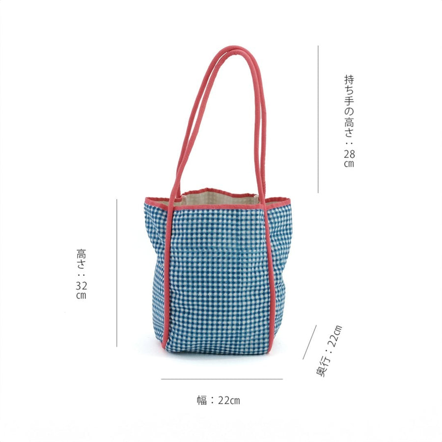 Block-printed gingham check bag with piping accents