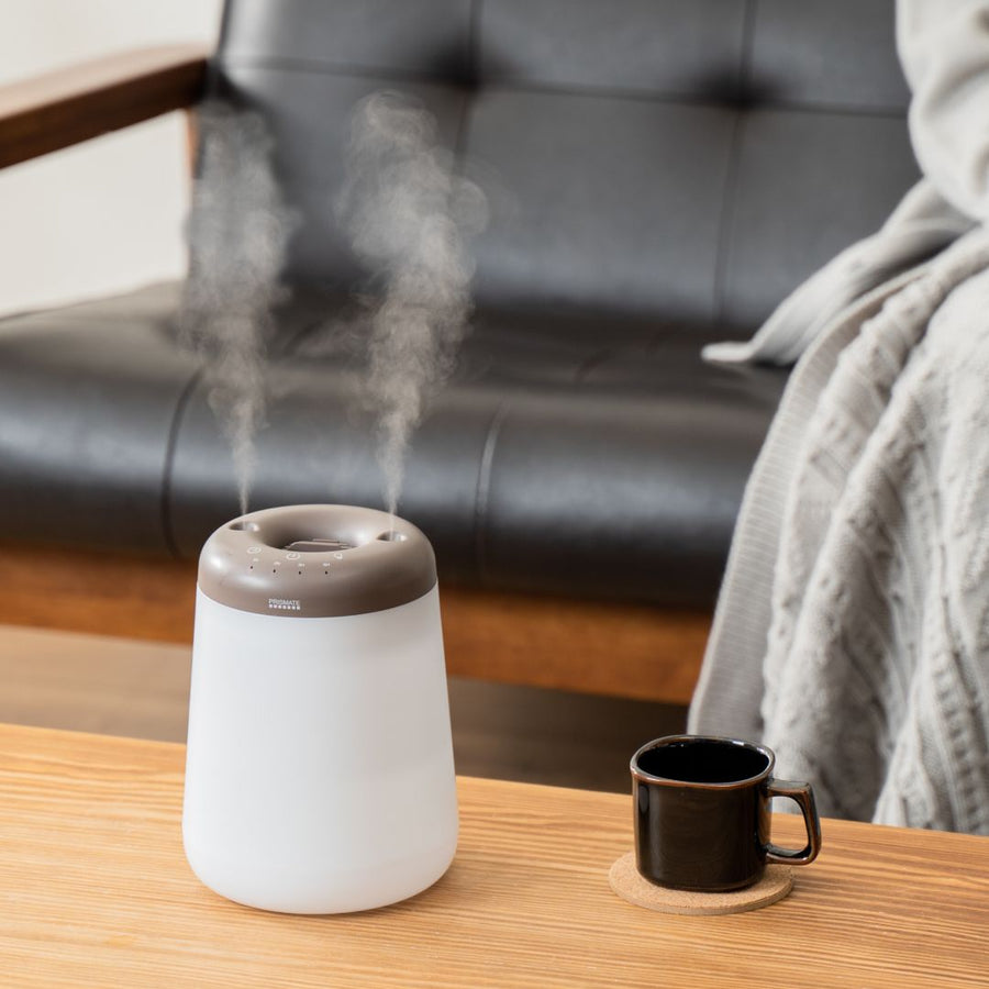 Cordless top-fill humidifier with dual mist function that prevents water from spilling even if it falls over.