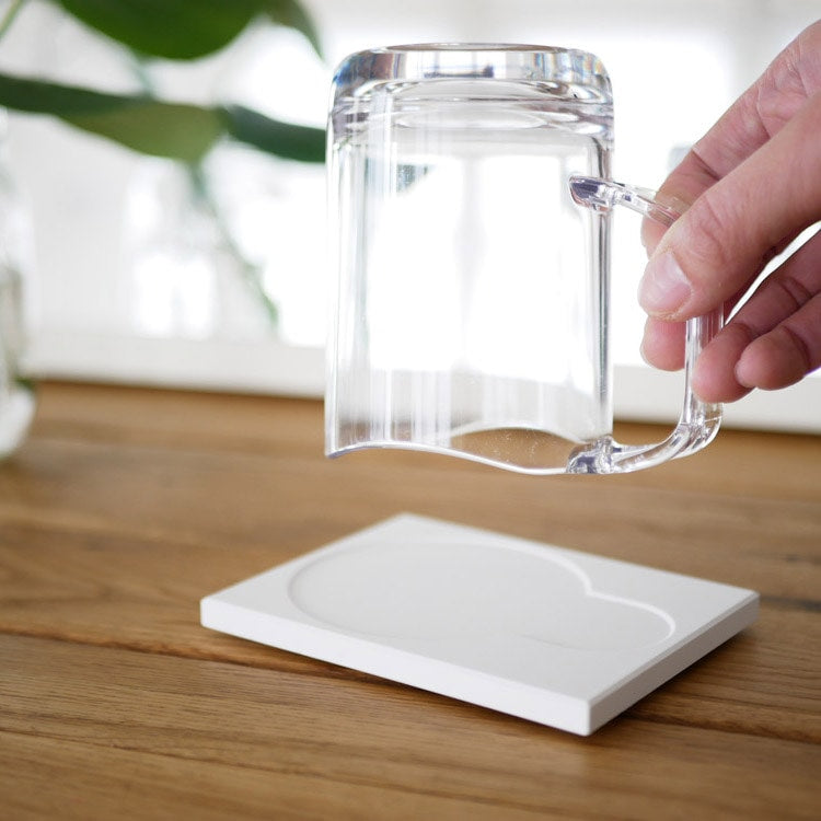 Water-draining stand mug, clear
