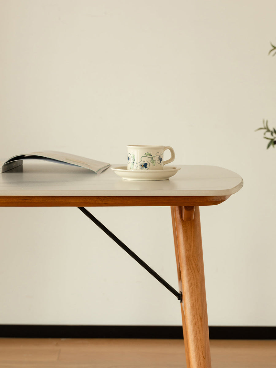 Marble-look ceramic rounded corner dining table