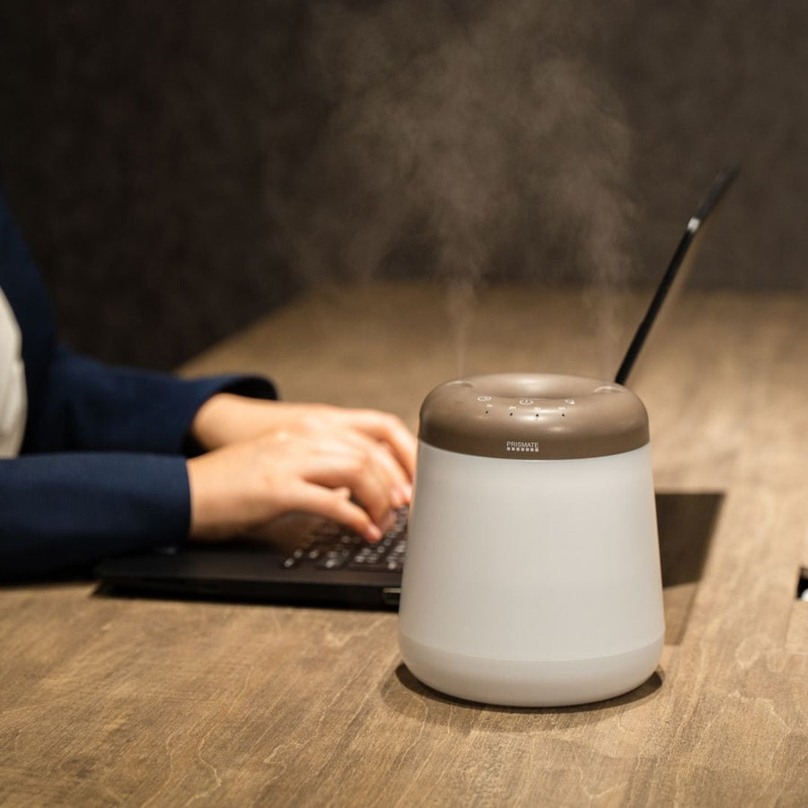 Cordless top-fill humidifier with dual mist function that prevents water spills even if it falls over