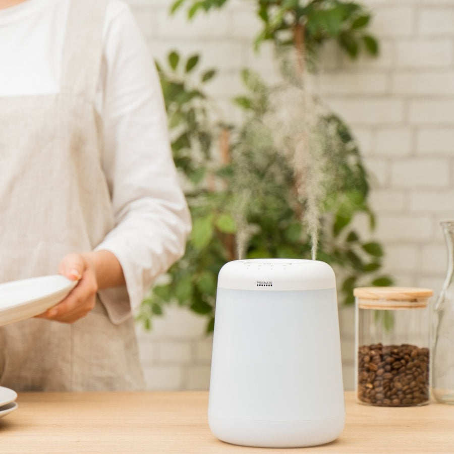 Cordless top-fill humidifier with dual mist function that prevents water from spilling even if it falls over.