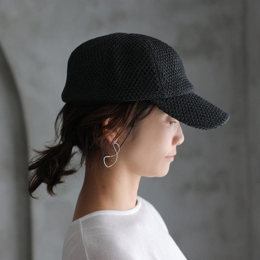 A paper cap that lets air through
