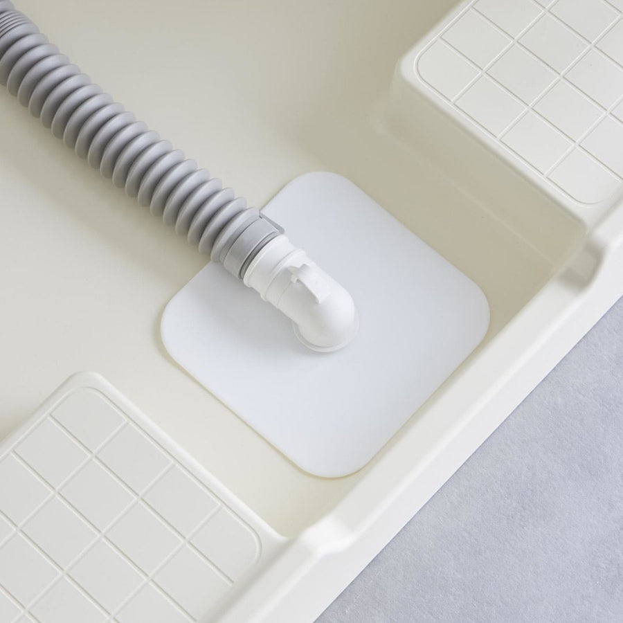 洗濯機排水トラップホコリ防止カバー