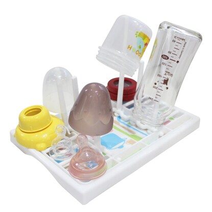 A baby bottle draining tray with removable slats for easy cleaning