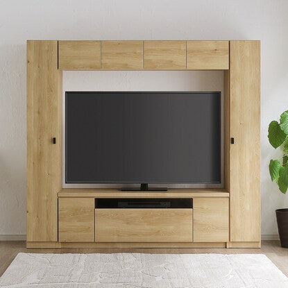 A TV stand that can also store a vacuum cleaner (NA)