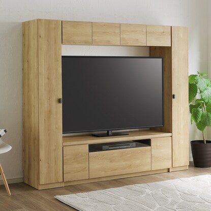 A TV stand that can also store a vacuum cleaner (NA)