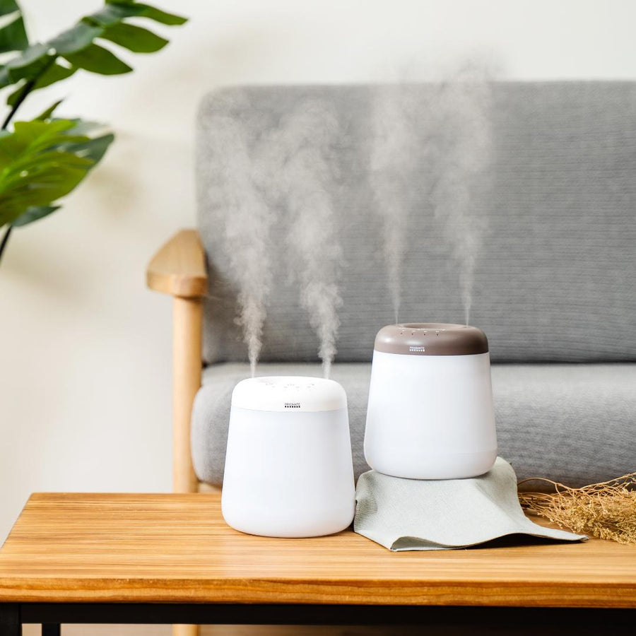 Cordless top-fill humidifier with dual mist function that prevents water spills even if it falls over