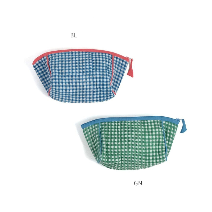 A block-printed gingham check pouch that makes it easy to see inside