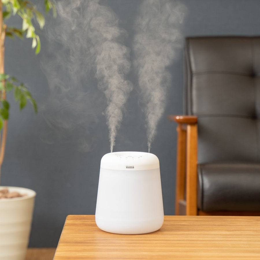 Cordless top-fill humidifier with dual mist function that prevents water spills even if it falls over