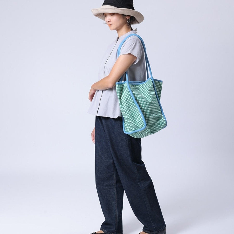 Block-printed gingham check bag with piping accents