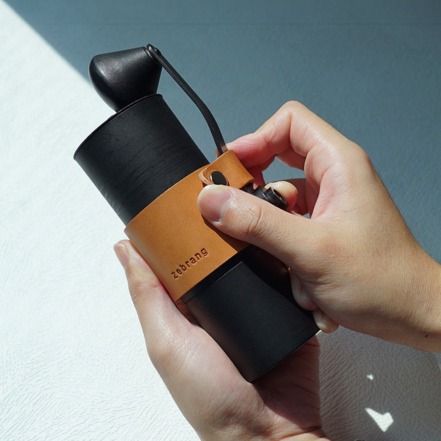 Stainless steel cutter and leather handle holder set