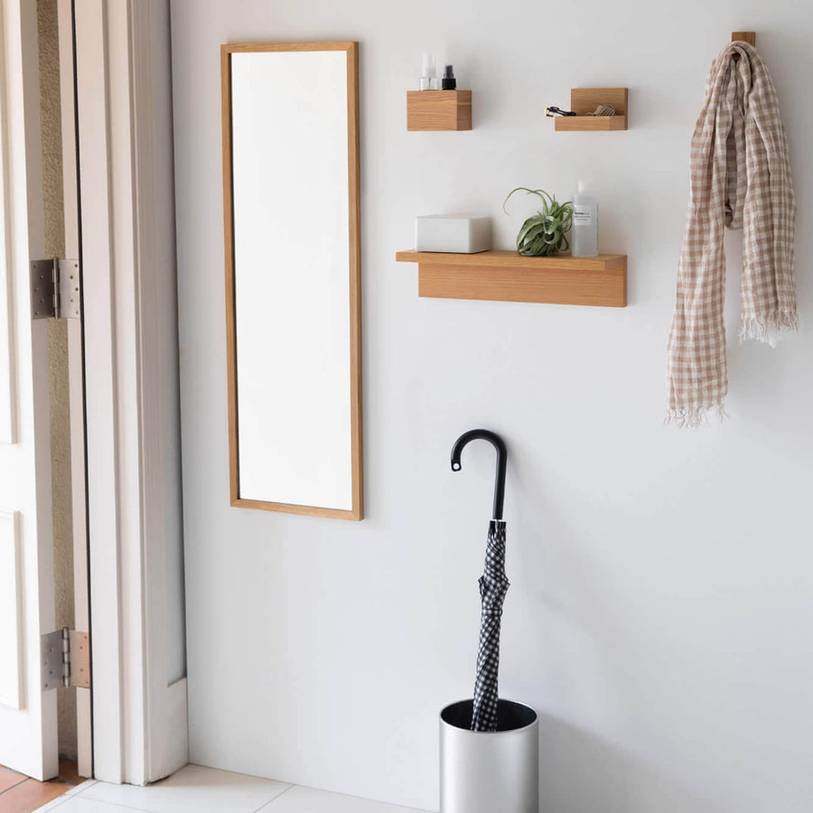 Wall-mounted furniture hooks in walnut