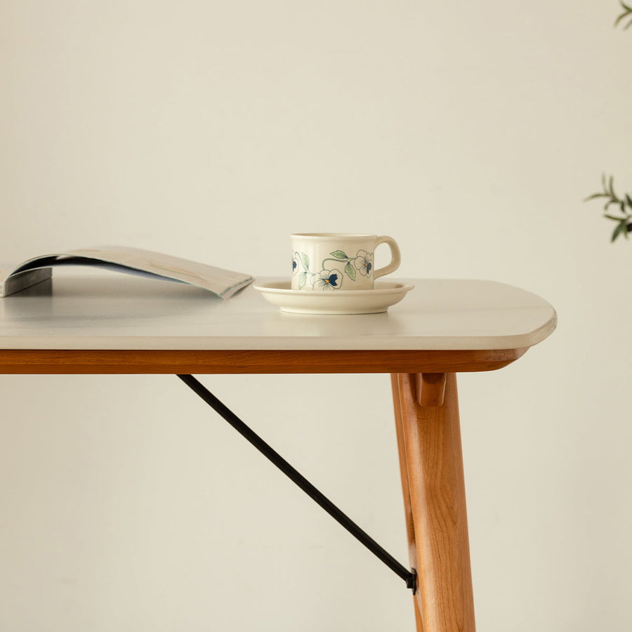 Marble-look ceramic rounded corner dining table
