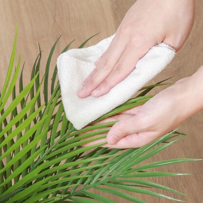 Refreshing fake greenery (palm in ceramic pot)