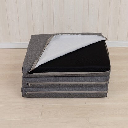 A sleeping mattress that can be used as an ottoman or stool (gray)