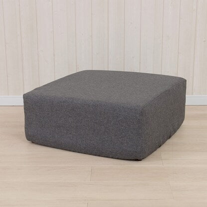 A sleeping mattress that can be used as an ottoman or stool (gray)