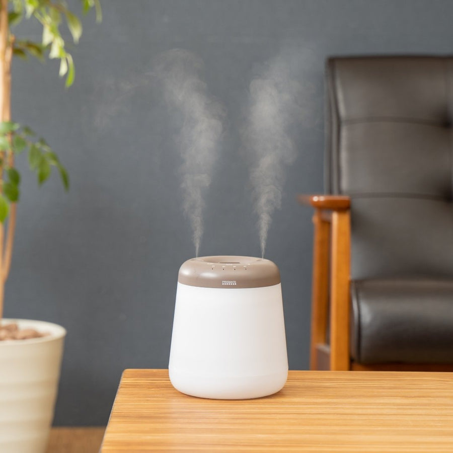 Cordless top-fill humidifier with dual mist function that prevents water spills even if it falls over