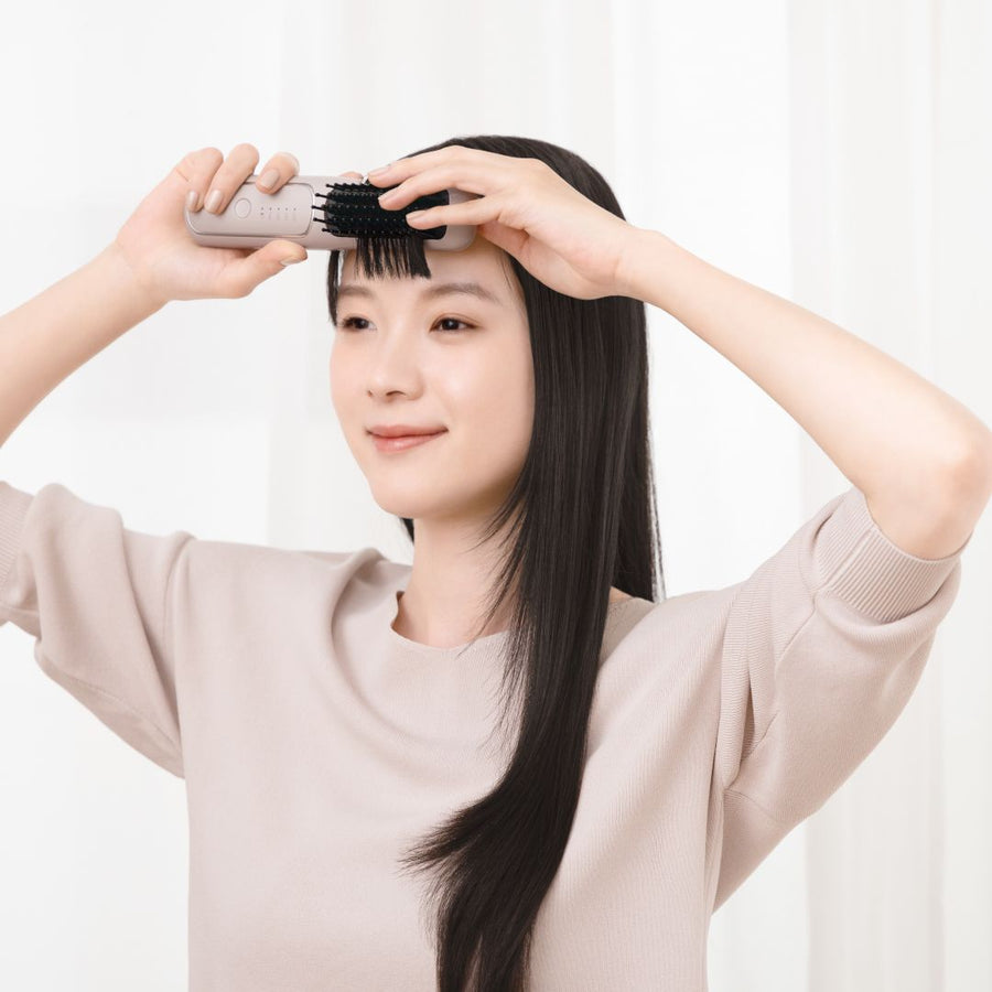 Rechargeable styling heater brush