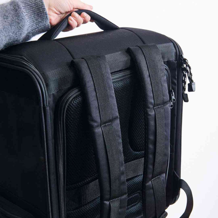 A lightweight pet backpack that can be folded and used as a cage