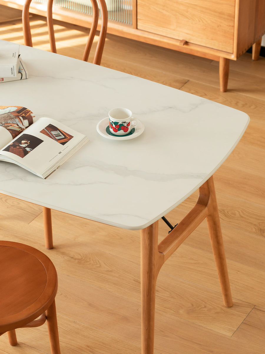 Marble-look ceramic rounded corner dining table