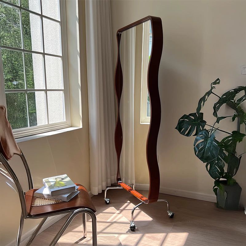Rotating full-length mirror magazine rack