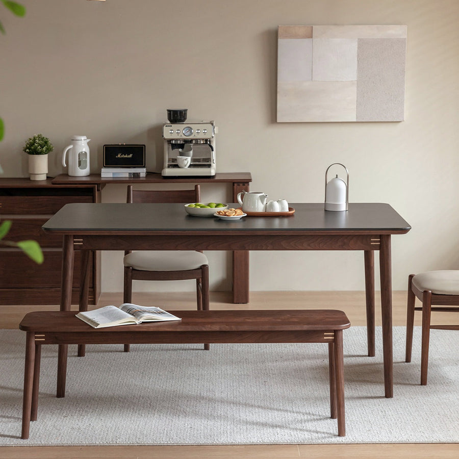 Walnut wood single ceramic top dining table