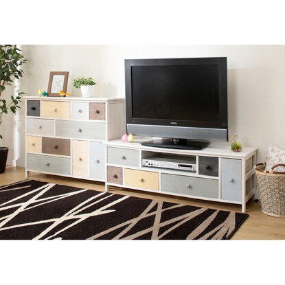 A pale, colorful, shabby TV stand (W113)