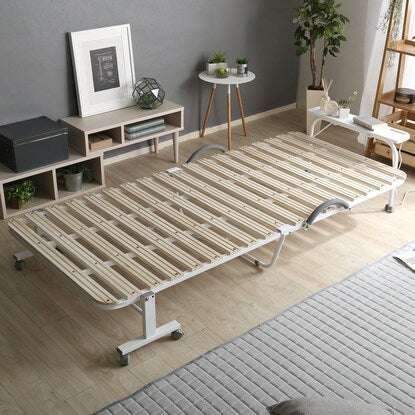 Folding wooden slat bed with shelf, outlet and casters (WH)