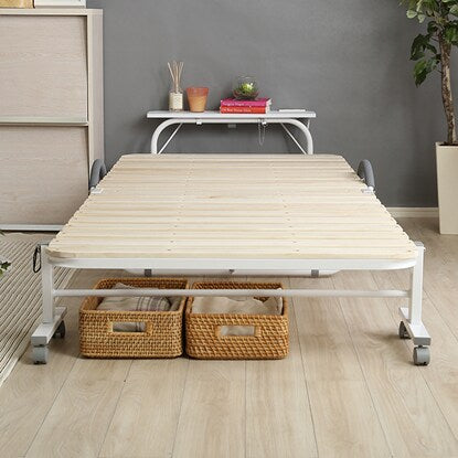 Folding wooden slat bed with shelf, outlet and casters (WH)