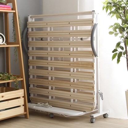 Folding wooden slat bed with shelf, outlet and casters (WH)