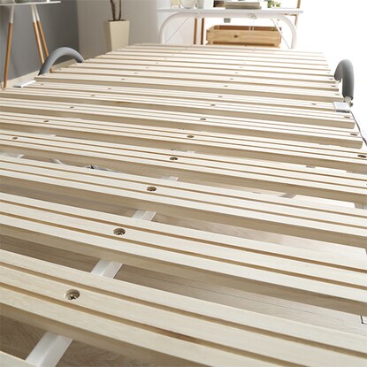 Folding wooden slat bed with shelf, outlet and casters (WH)