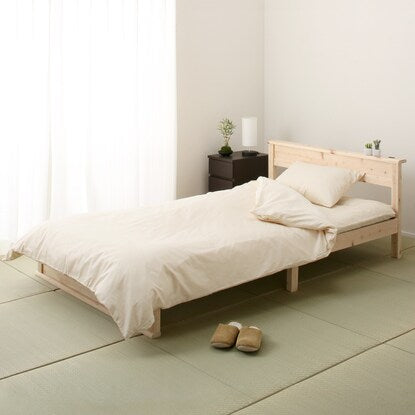 Semi-double bed frame made of cypress and rush grass with shelf (with power outlet)