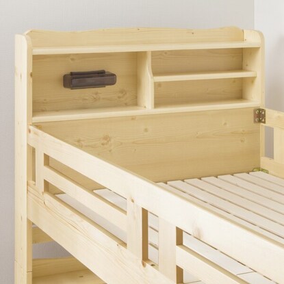 Beautiful pine wood grain. A sturdy bunk bed with shelves and lighting (NA)