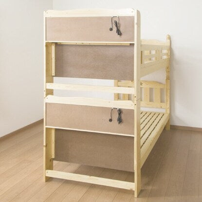 Beautiful pine wood grain. A sturdy bunk bed with shelves and lighting (NA)