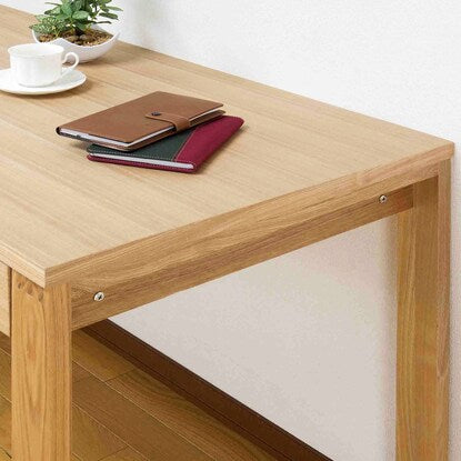 A natural wood desk with beautiful grain of ash veneer. Depth 59cm (width 90cm light brown)