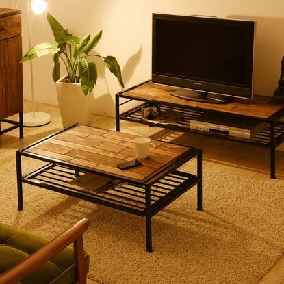 A combination of natural wood and steel finished with vegetable oil paint (center table)