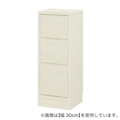 A slim cabinet with a beautiful wood grain pattern and drawers (width 32 x height 85 cm, gloss finish WW)