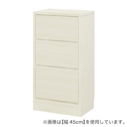 A slim cabinet with a beautiful wood grain pattern and drawers (width 42 x height 85 cm, gloss finish WW)