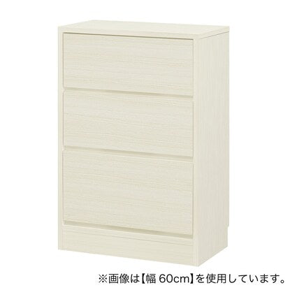 A slim cabinet with a beautiful wood grain pattern and drawers (width 51 x height 85 cm, gloss finish WW)