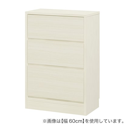 A slim cabinet with a beautiful wood grain pattern and drawers (width 52 x height 85 cm, gloss finish WW)